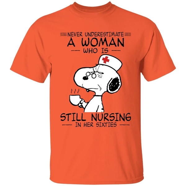 snoopy never underestimate a woman who is still nursing in her sixties shirt orange